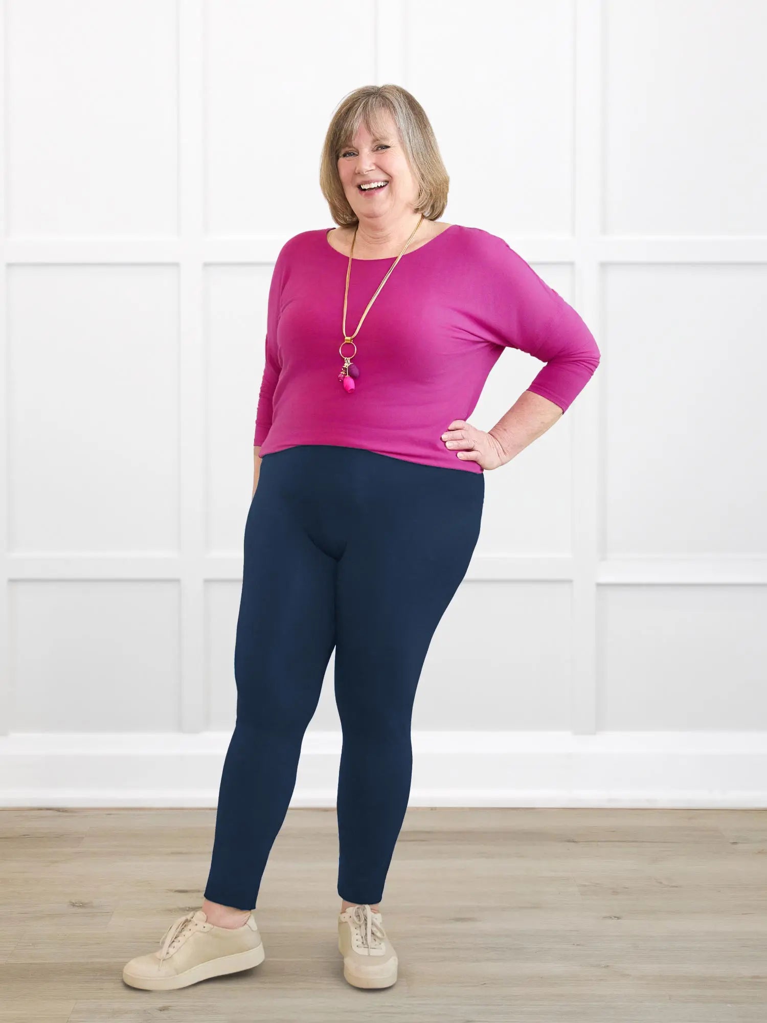 Lucy mid rise legging for women in Navy on model Laurie, size XL @Laurie-XL 