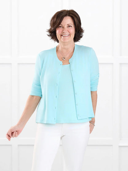 Maribel crewneck sweater knit cardigan in Fiji blue on model Donna, size S @Donna-S 