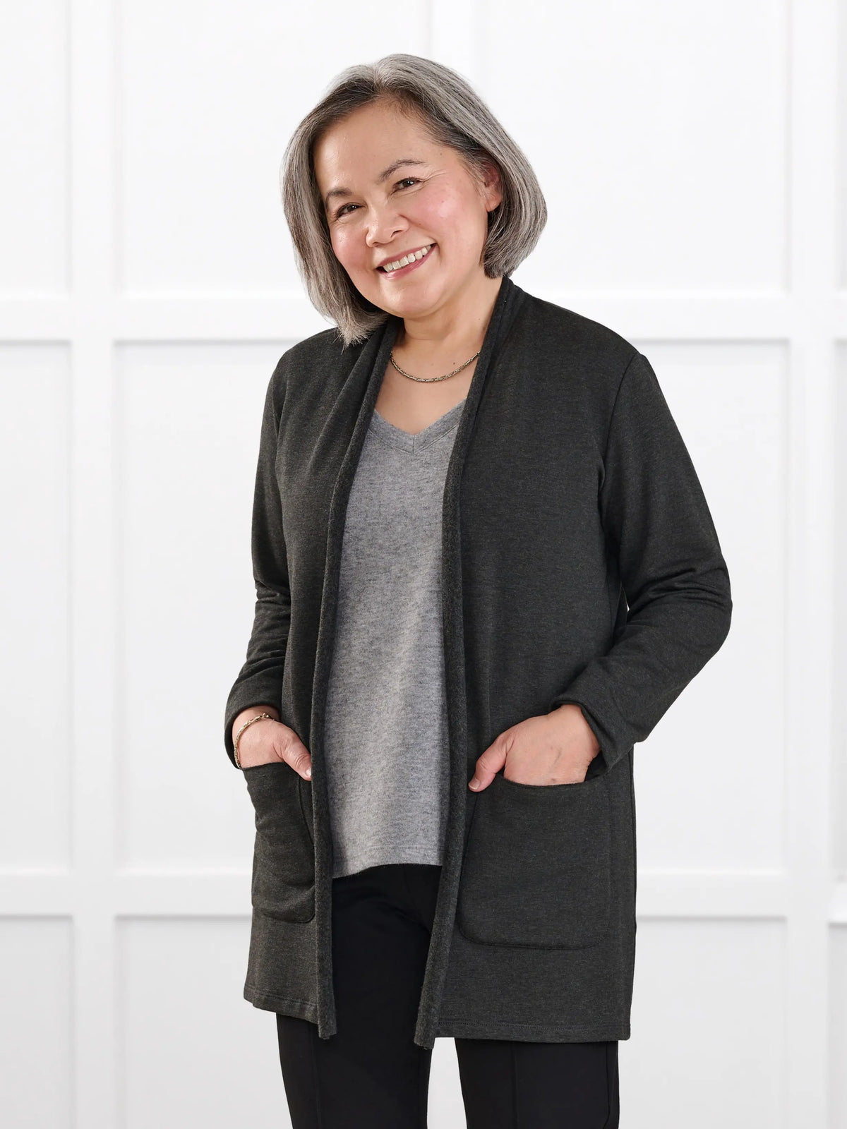 Montana fleece pocket cardigan for women in Charcoal on model Terry, size S Petite @Terry-S-petite 