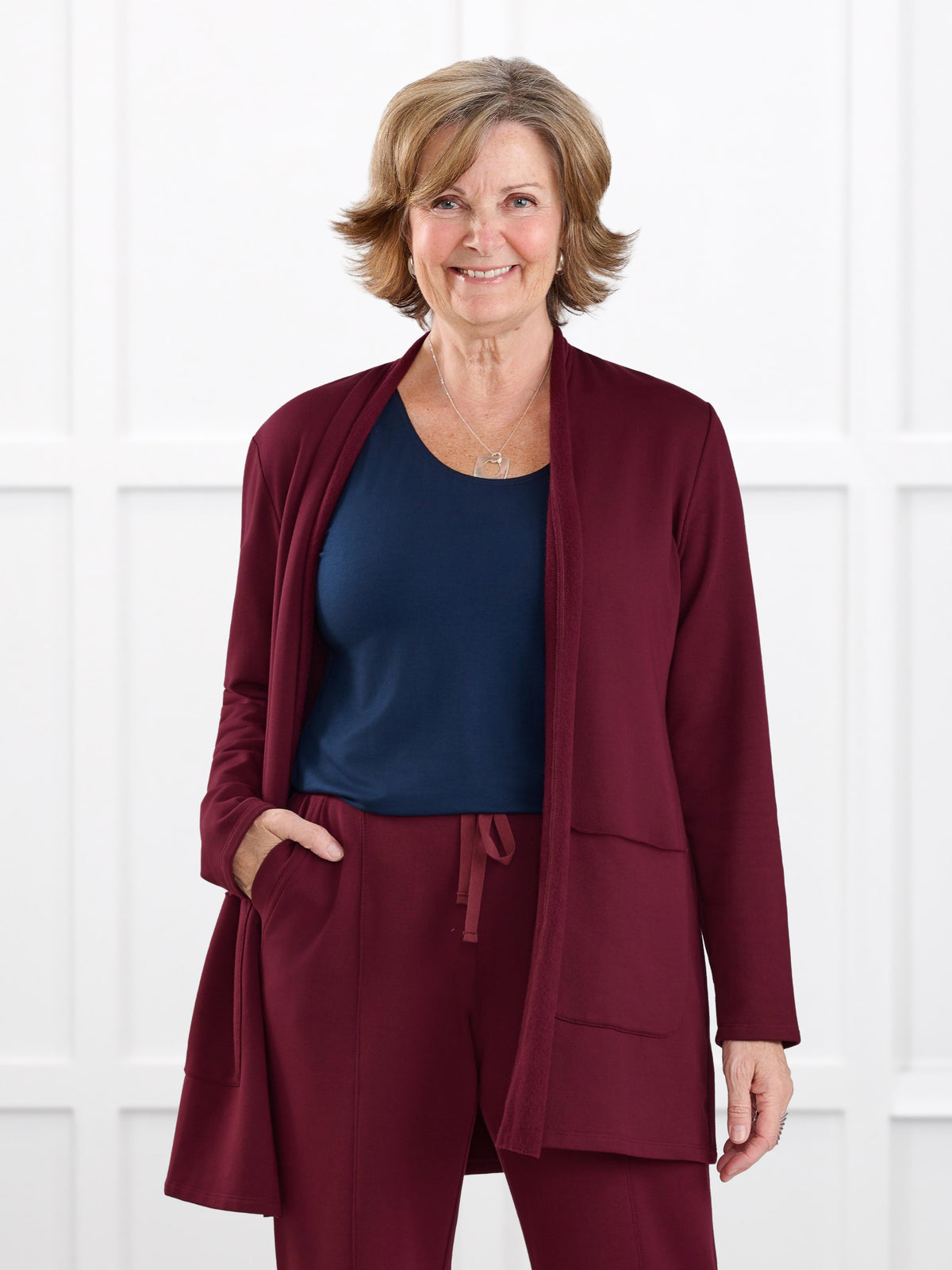 Montana fleece pocket cardigan for women in Merlot on model Donna, size S Regular @Donna-S-regular 