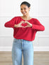 Mylene long sleeve dolman top for women in Poppy red on model Meron, size XS @Meron-XS 