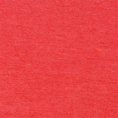 A swatch of Miik's papaya melange orange fabric