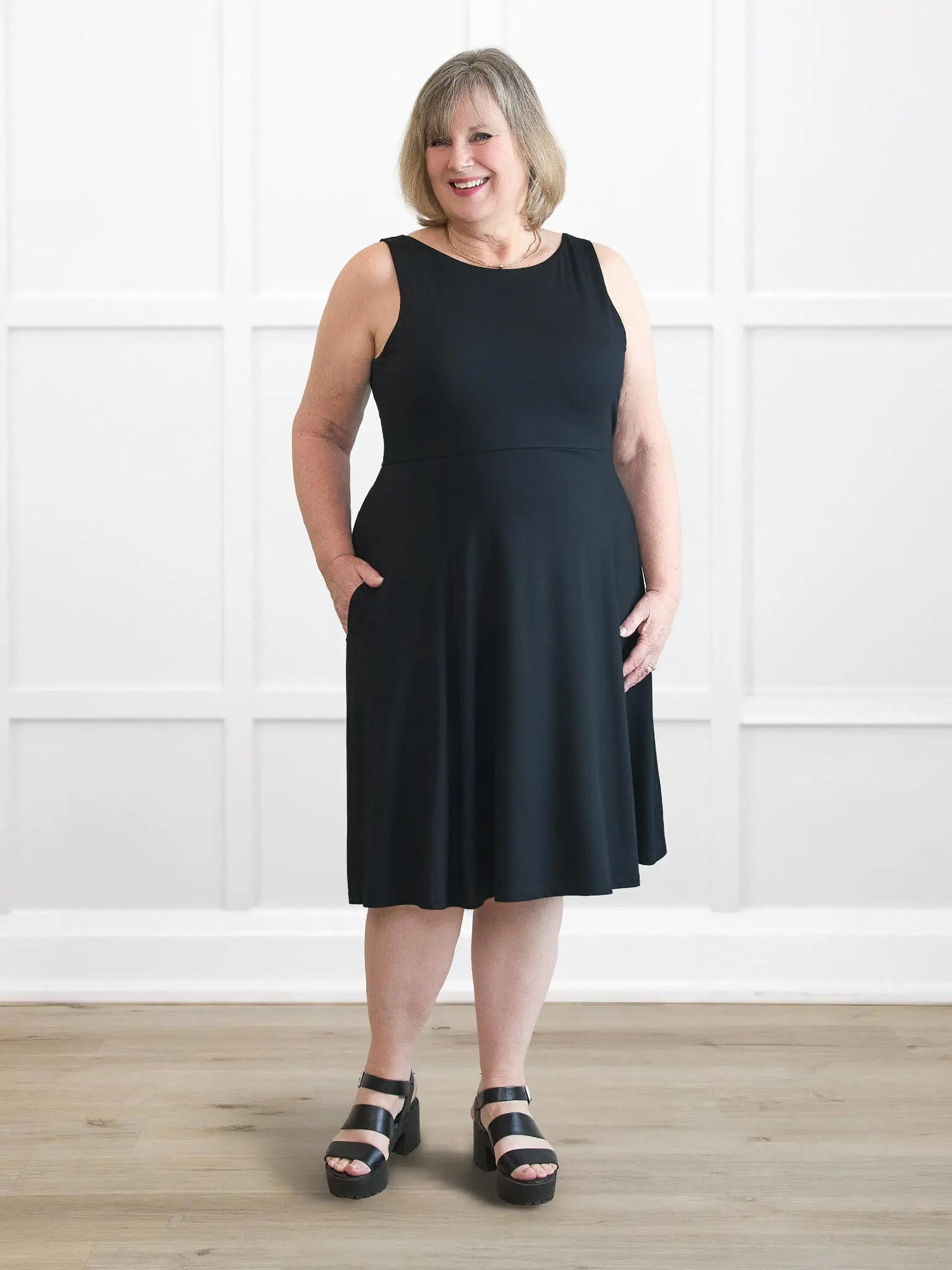 Rae reversible neckline knee length dress for women in Black on model Laurie, size XL @Laurie-XL 