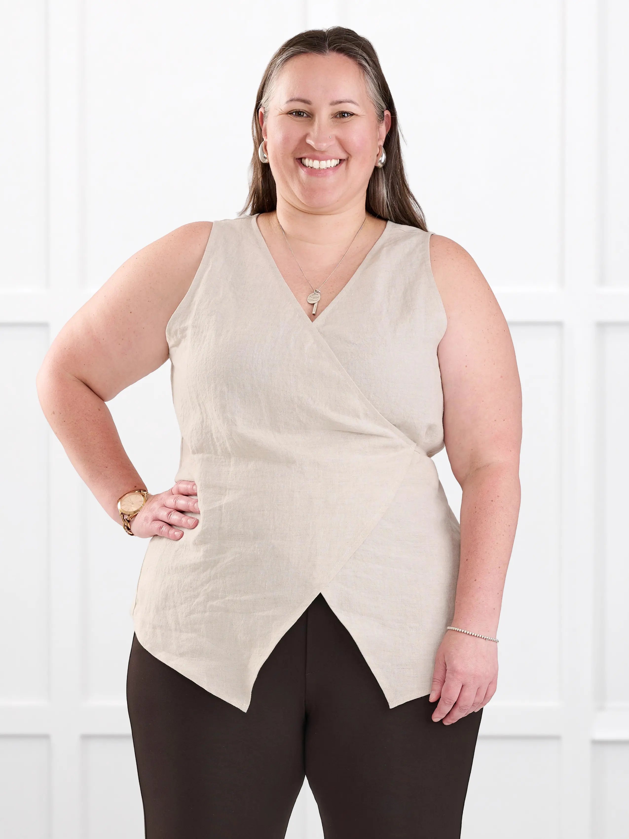 Regina sleeveless linen wrap top for women in Sand linen on model Cristina, size XXL @Cristina-XXL 