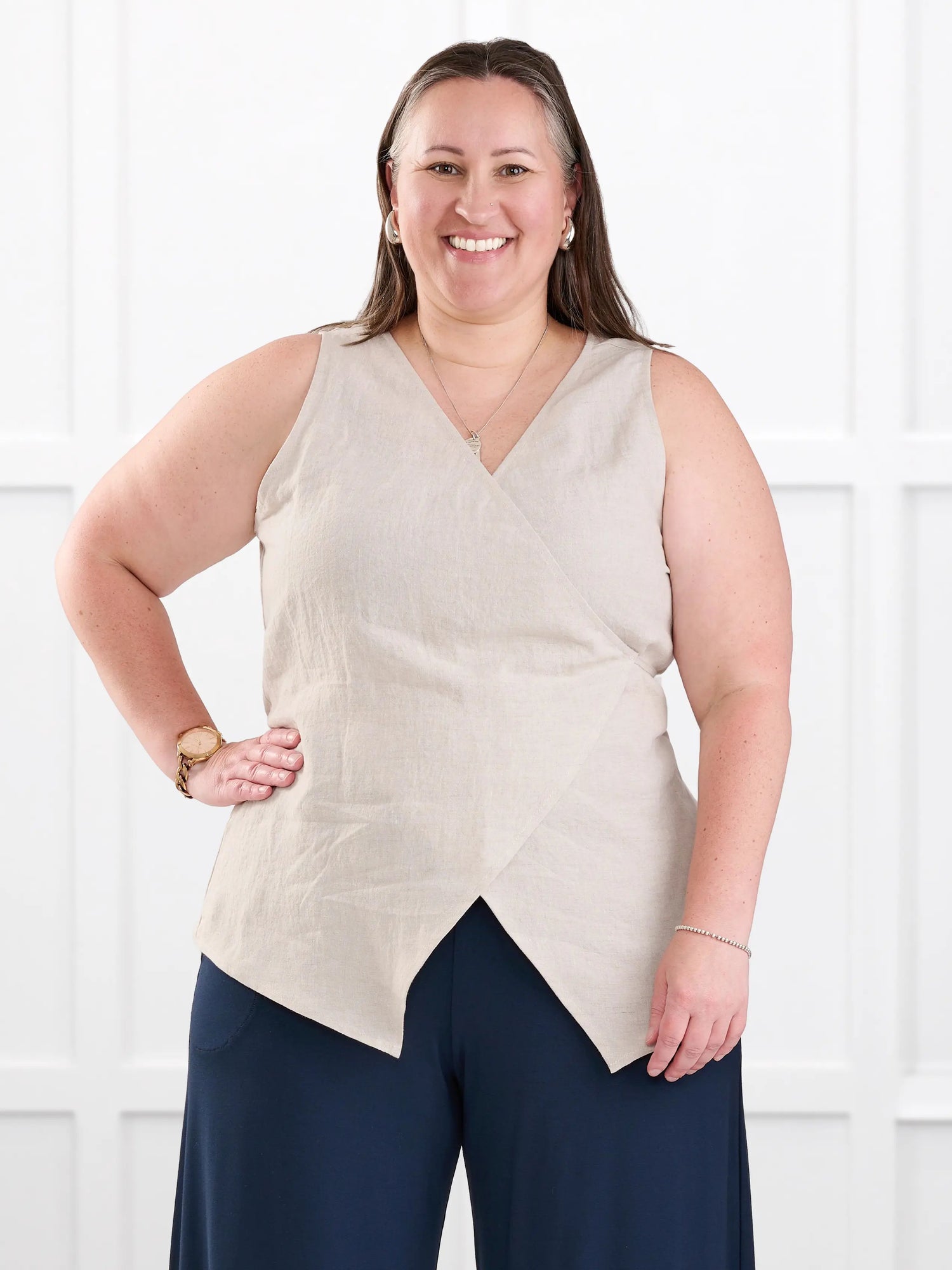 Regina sleeveless linen wrap top for women in Sand linen on model Cristina, size XXL @Cristina-XXL 