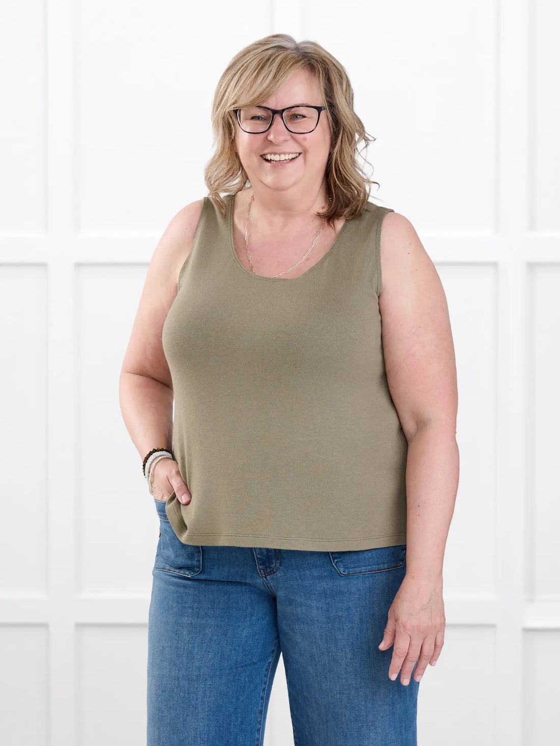 Ricki reversible neckline sweater knit tank for women in Thyme on model Deb, size XL @Deb-XL 