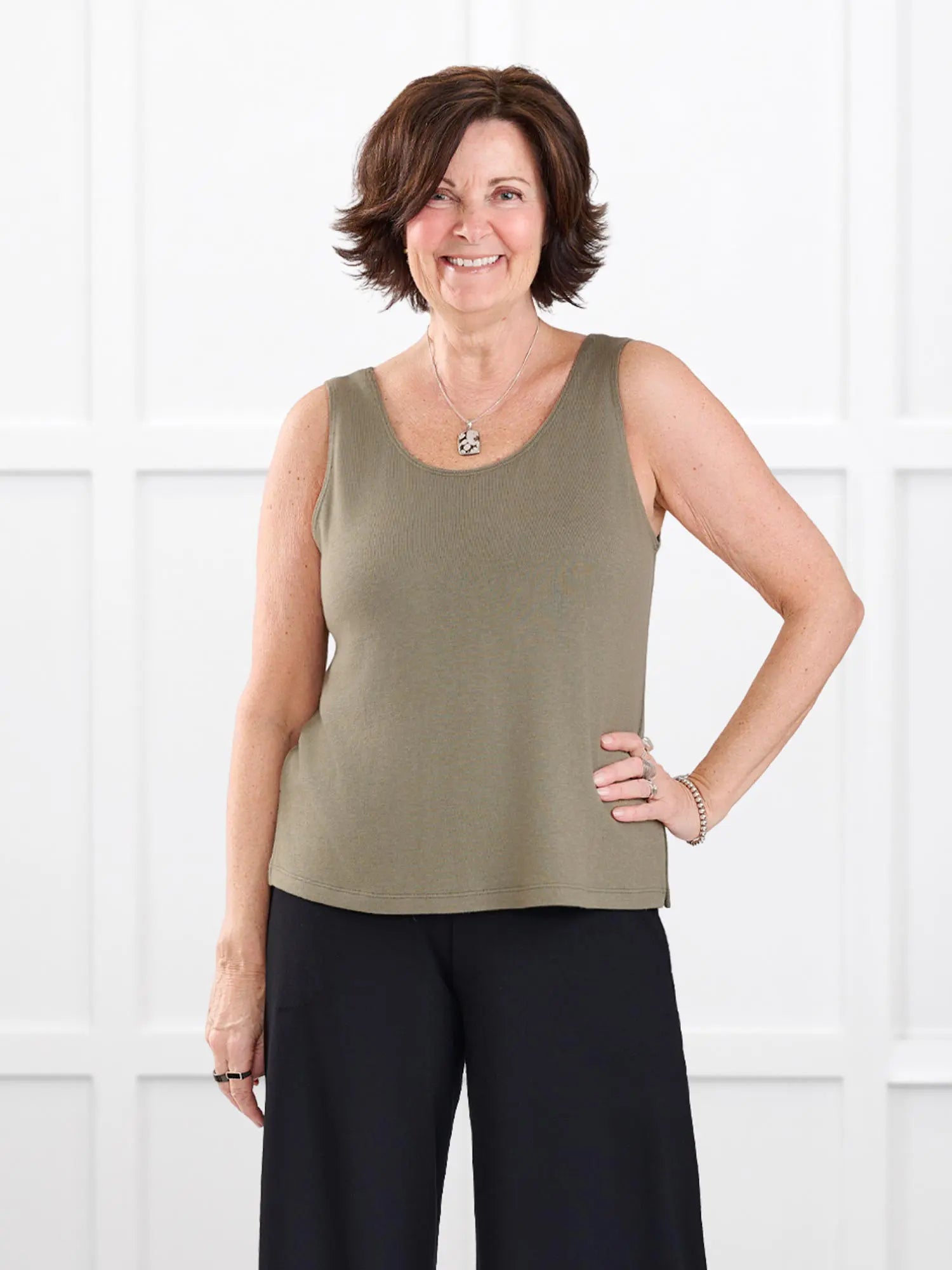 Ricki reversible neckline sweater knit tank for women in Thyme on model Donna, size S @Donna-S 