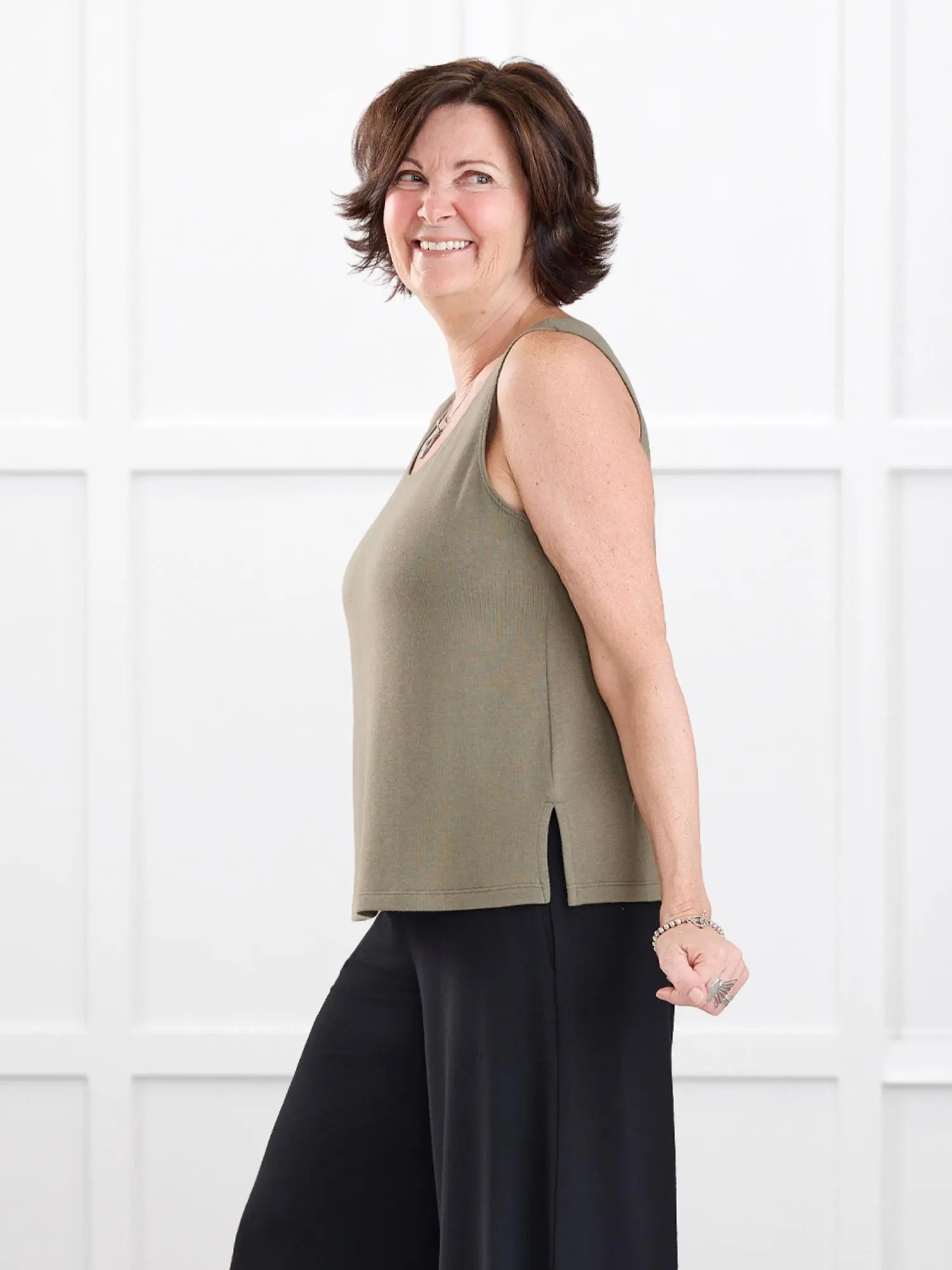 Ricki reversible neckline sweater knit tank for women in Thyme on model Donna, size S @Donna-S 