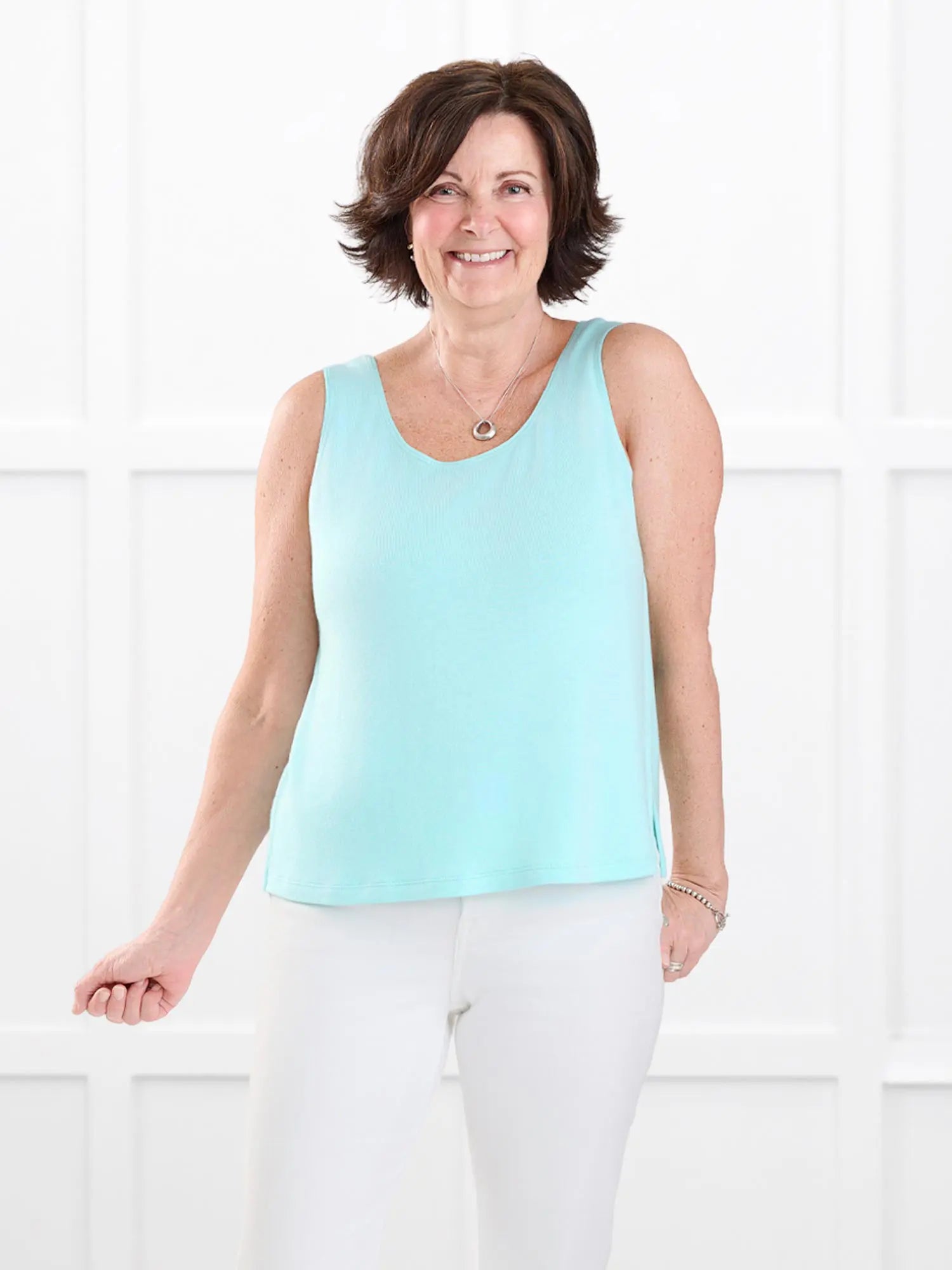 Ricki reversible neckline sweater knit tank for women in Fiji blue on model Donna, size S @Donna-S 