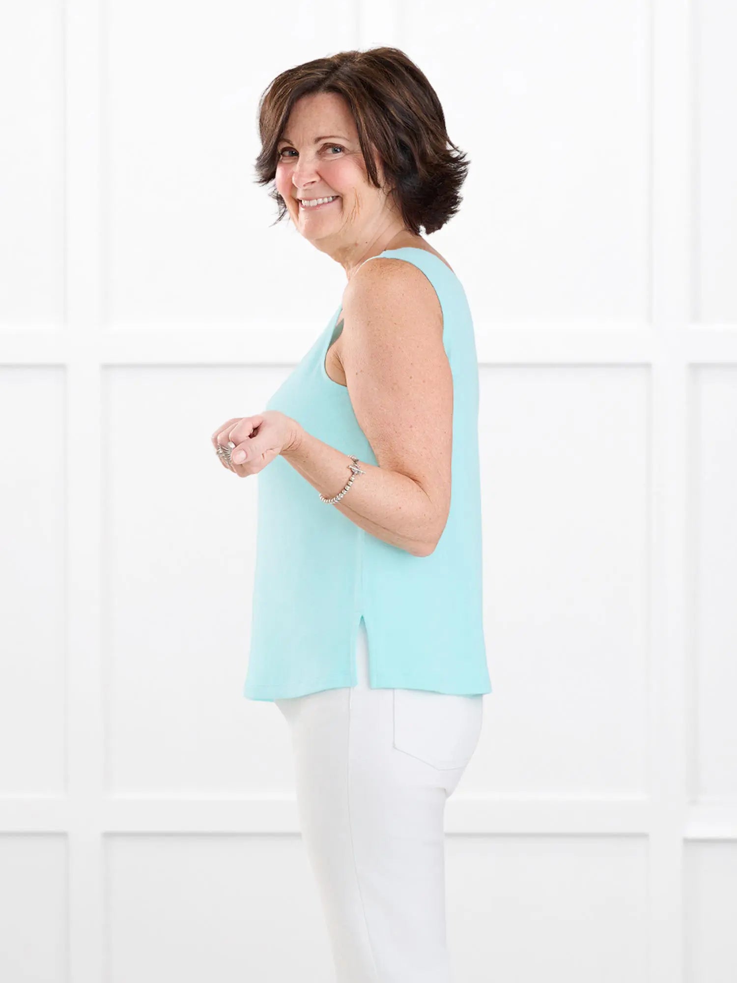 Ricki reversible neckline sweater knit tank for women in Fiji blue on model Donna, size S @Donna-S 
