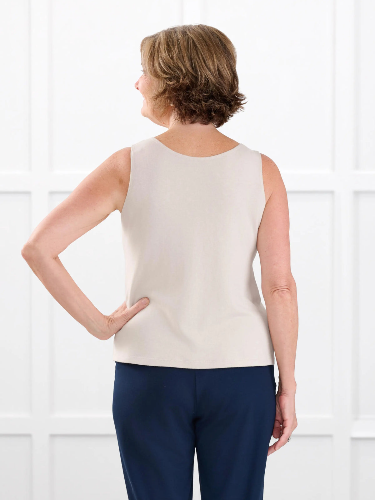 Ricki reversible neckline sweater knit tank for women in Seashell on model Donna, size S @Donna-S 