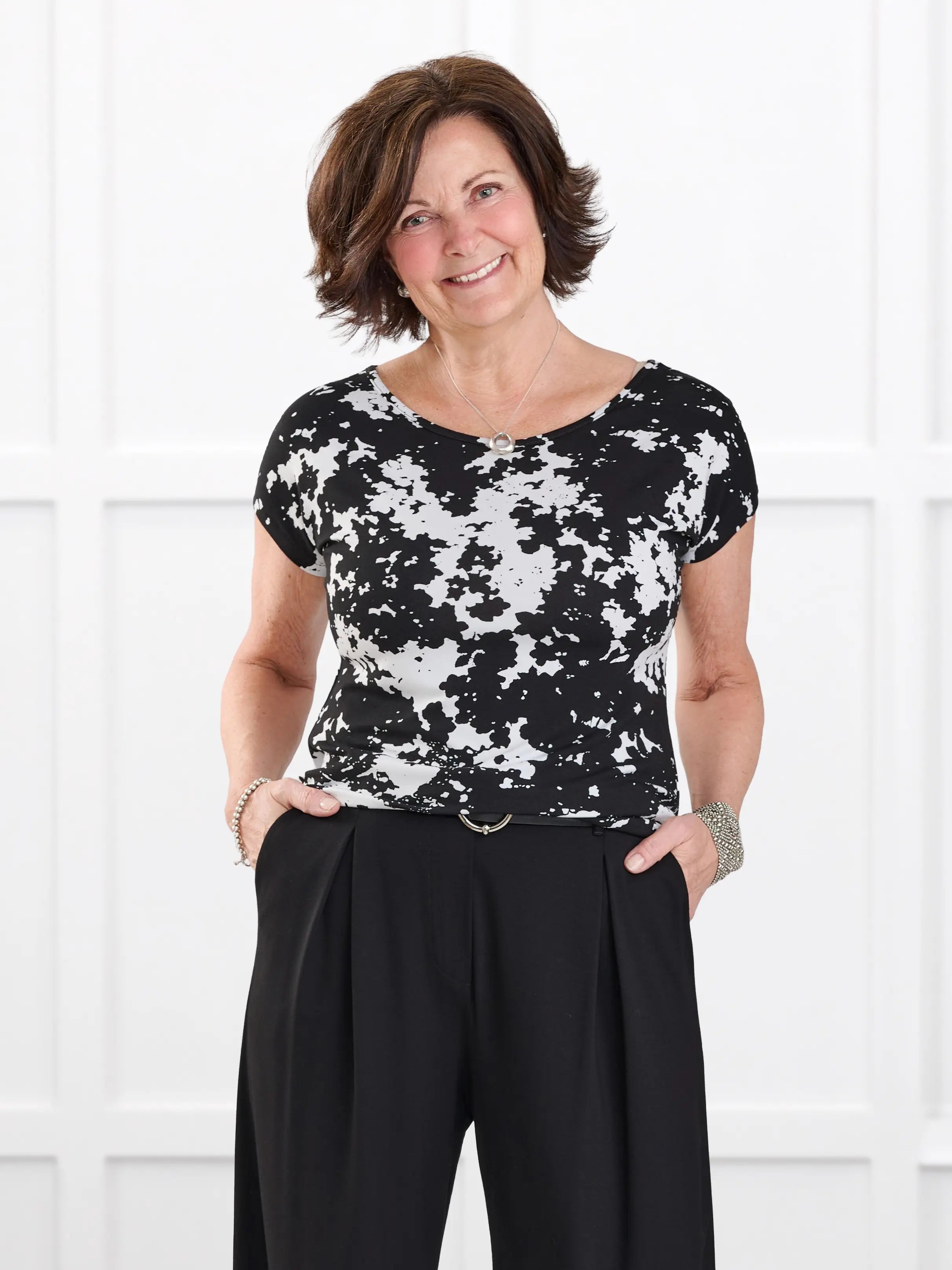 Rio reversible neckline dolman tee in Moo’d bloom on model Donna, size S @Donna-S 