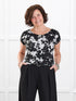 Rio reversible neckline dolman tee in Moo’d bloom on model Donna, size S @Donna-S 