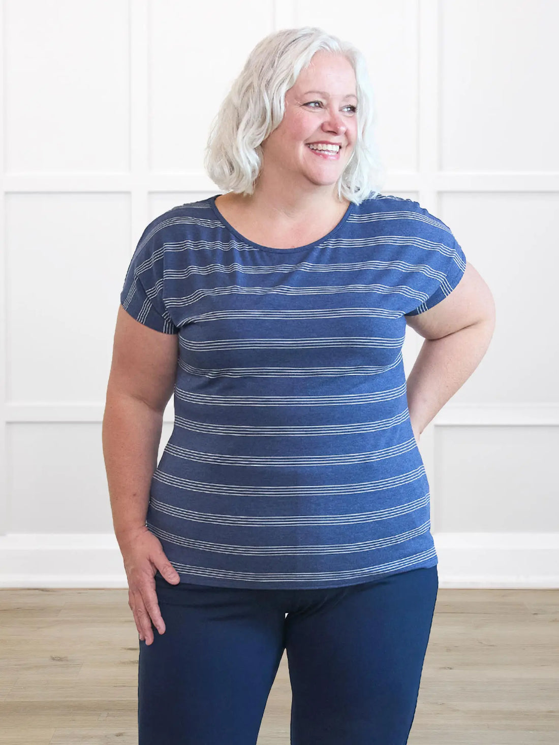 Rio reversible neckline dolman tee in Navy melange stripe on model Colleen, size XXL @Colleen-XXL 