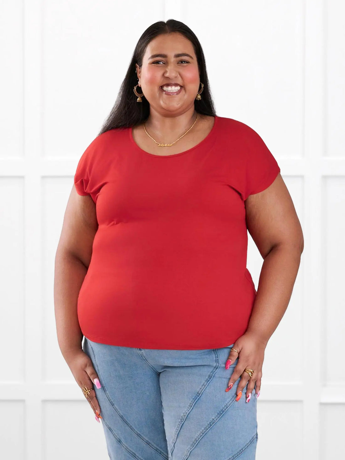 Rio reversible neckline dolman tee for women in Chili on model Sureka, size 3X @Sureka-3x 