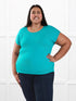 Rio reversible neckline dolman tee for women in Sea glass on model Sureka, size 3X @Sureka-3x 