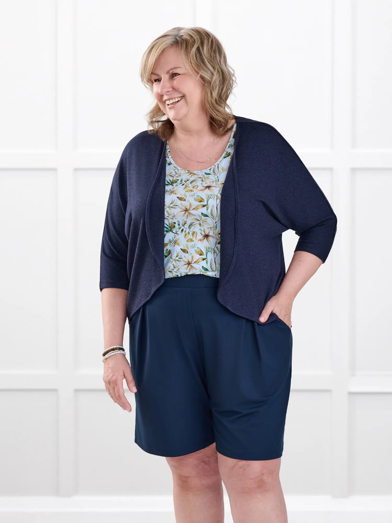 Saleema tailored pleated short for women in Navy on model Deb, size XL @Deb-XL 