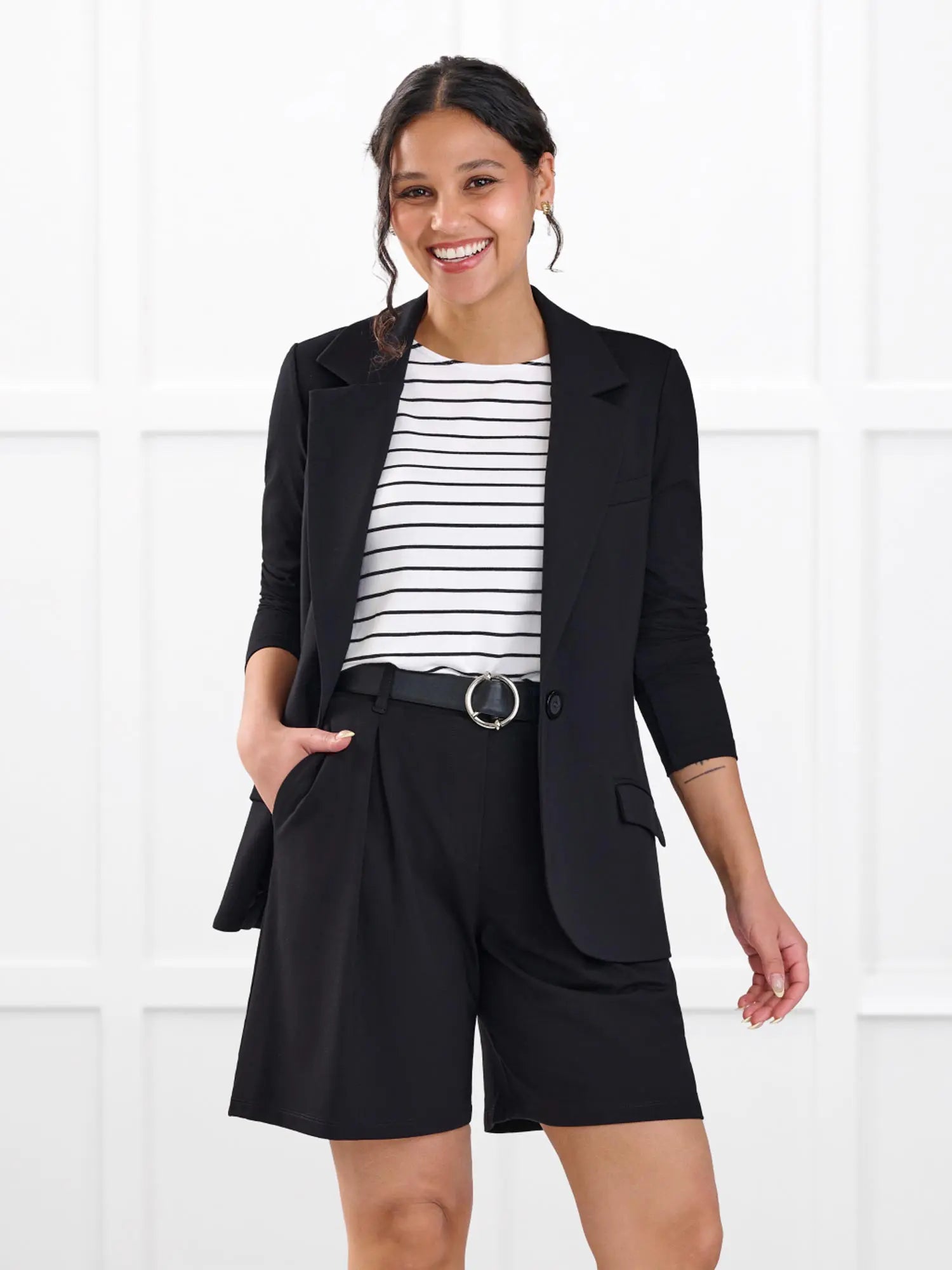 Saleema tailored pleated short for women in Black on model Meron, size XS @Meron-XS 
