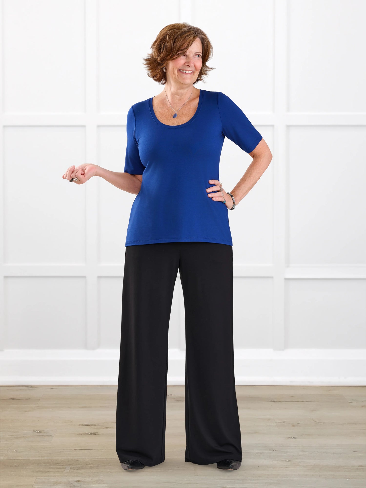 Samara wide leg pocket pant for women in Black on model Donna, size S Regular @Donna-S-regular 