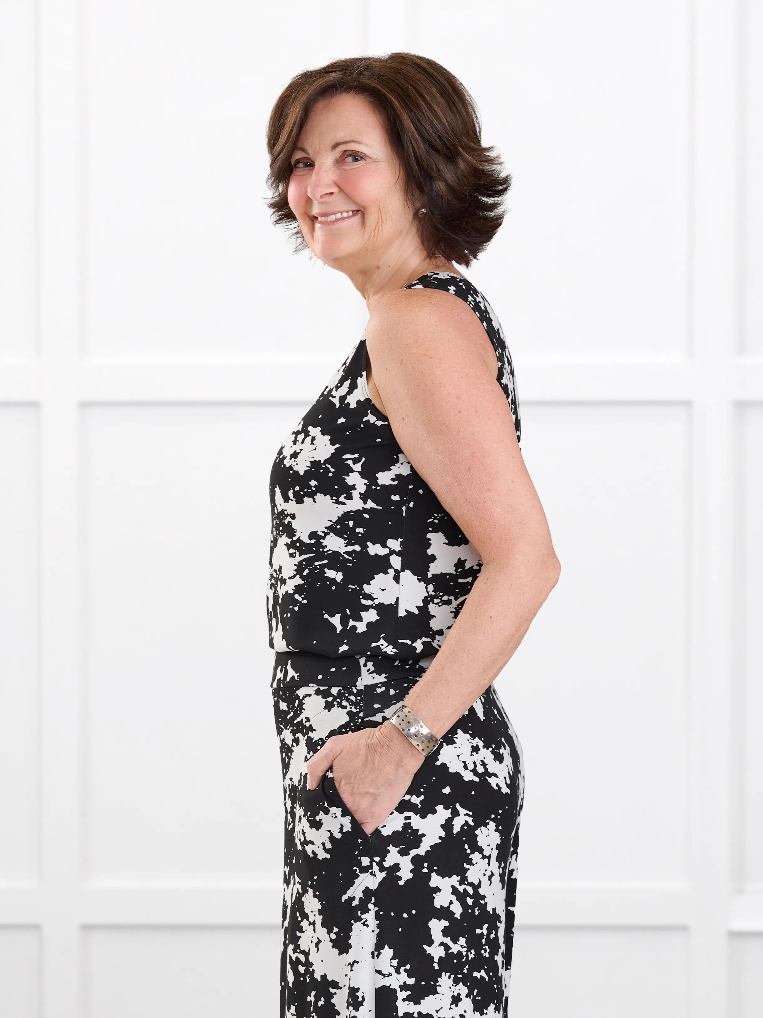 Shandra reversible neckline tank top in Moo’d bloom on model Donna, size S regular @Donna-S-regular 
