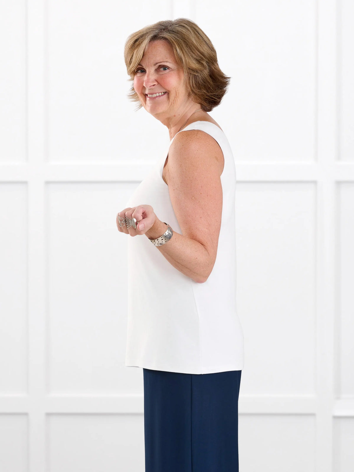 Shandra reversible neckline tank top in White on model Donna, size S Regular @Donna-S-regular 