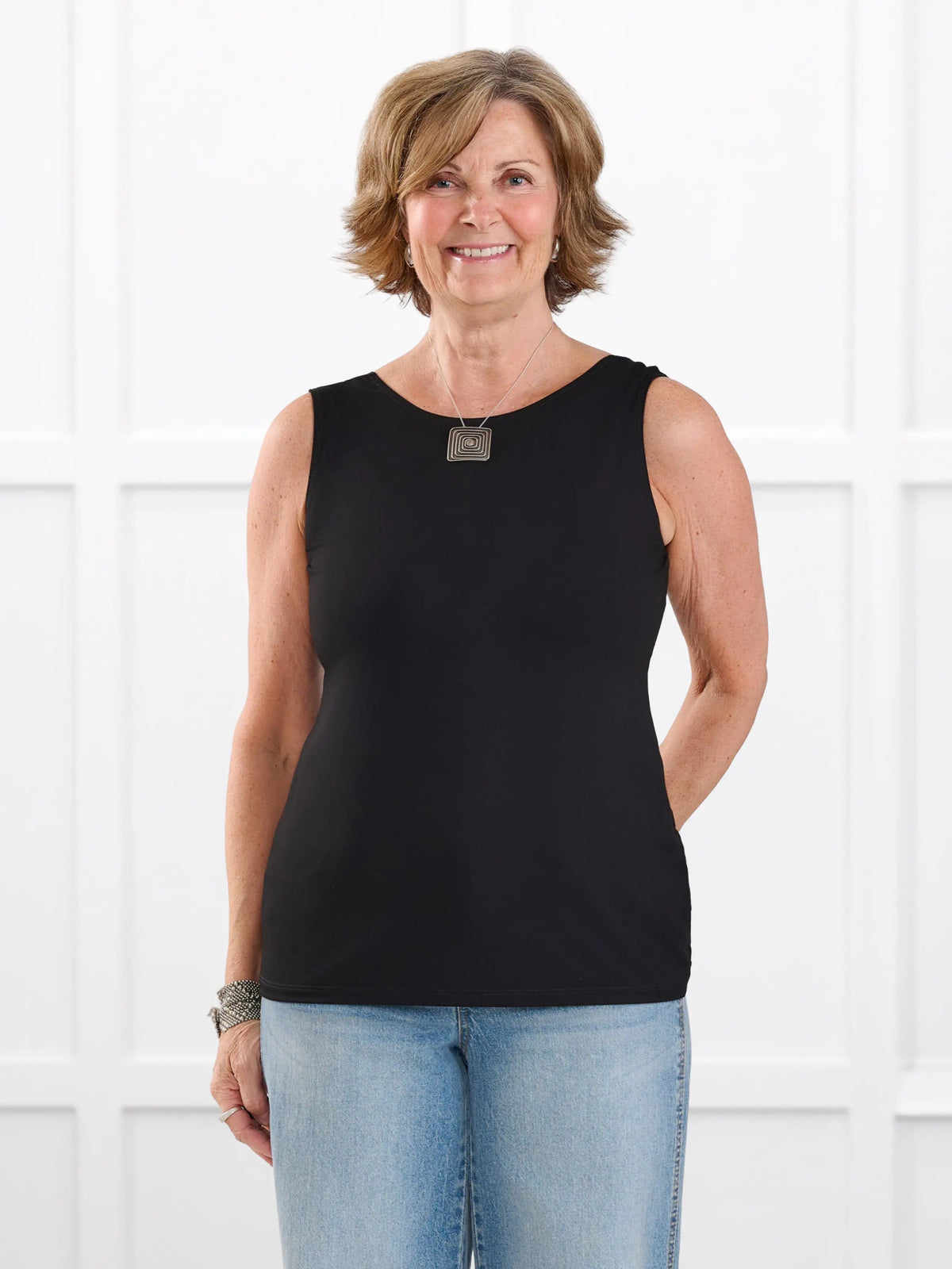Shandra reversible neckline tank top in Black on model Donna, size S Regular @Donna-S-regular 