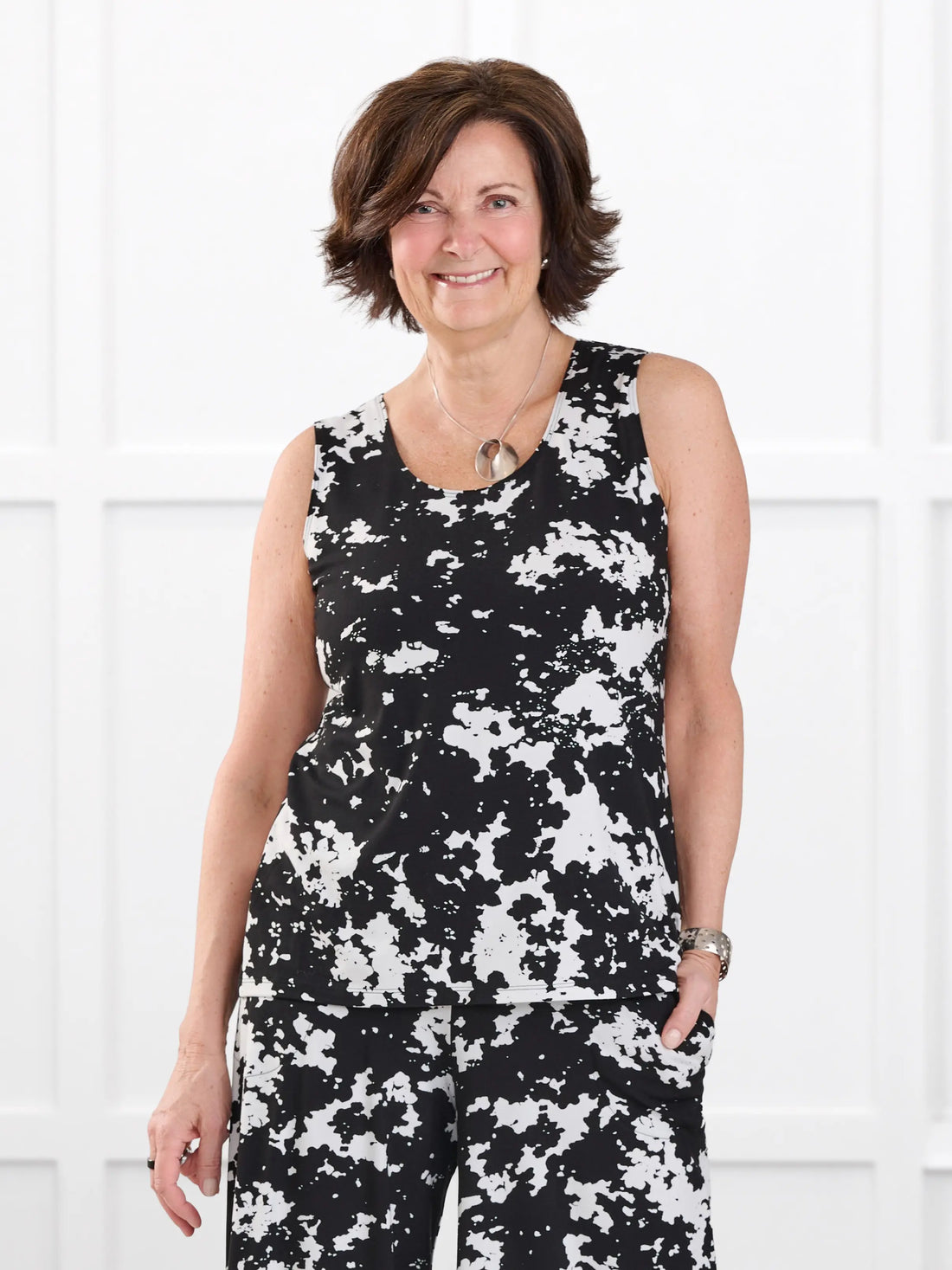 Shandra reversible neckline tank top in Moo’d bloom on model Donna, size S regular @Donna-S-regular 