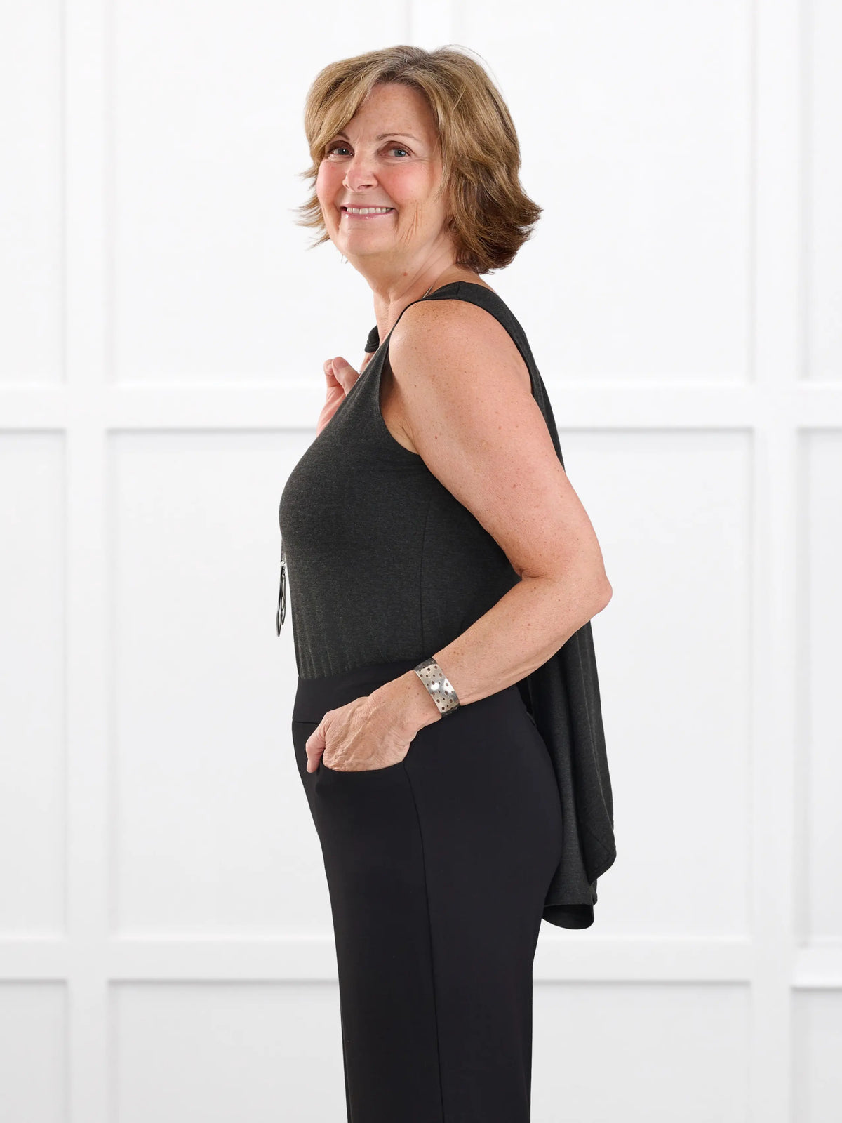 Shandra reversible neckline tank top for women in Charcoal on model Donna, size S Regular @Donna-S-regular 