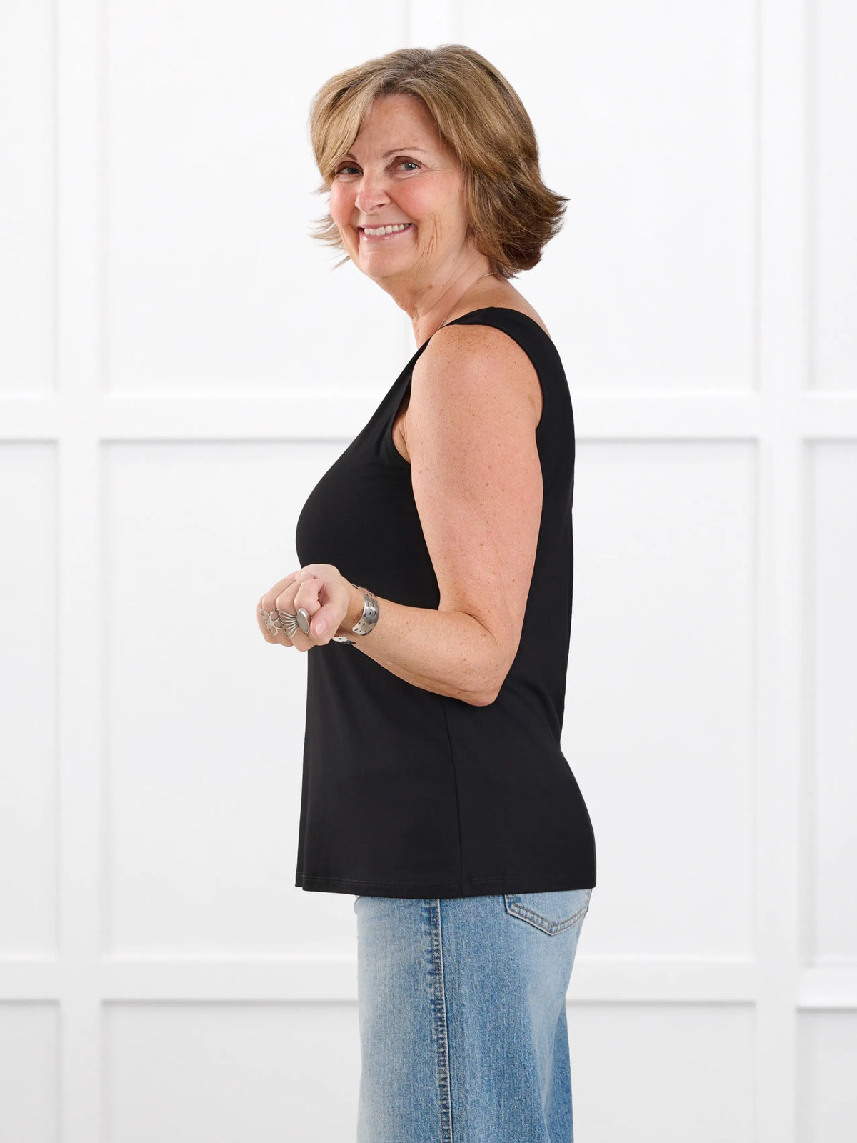 Shandra reversible neckline tank top in Black on model Donna, size S Regular @Donna-S-regular 