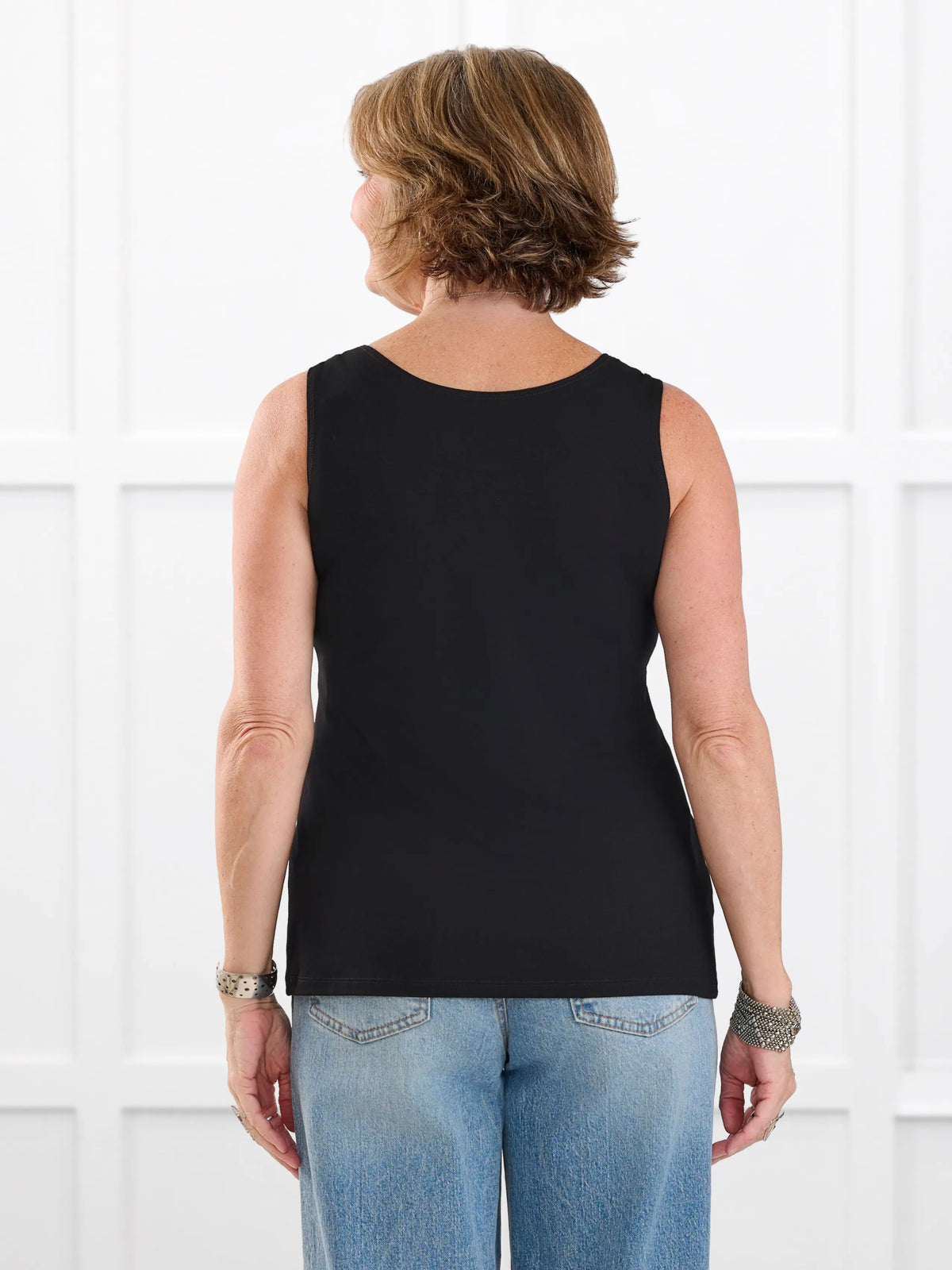 Shandra reversible neckline tank top in Black on model Donna, size S Regular @Donna-S-regular 