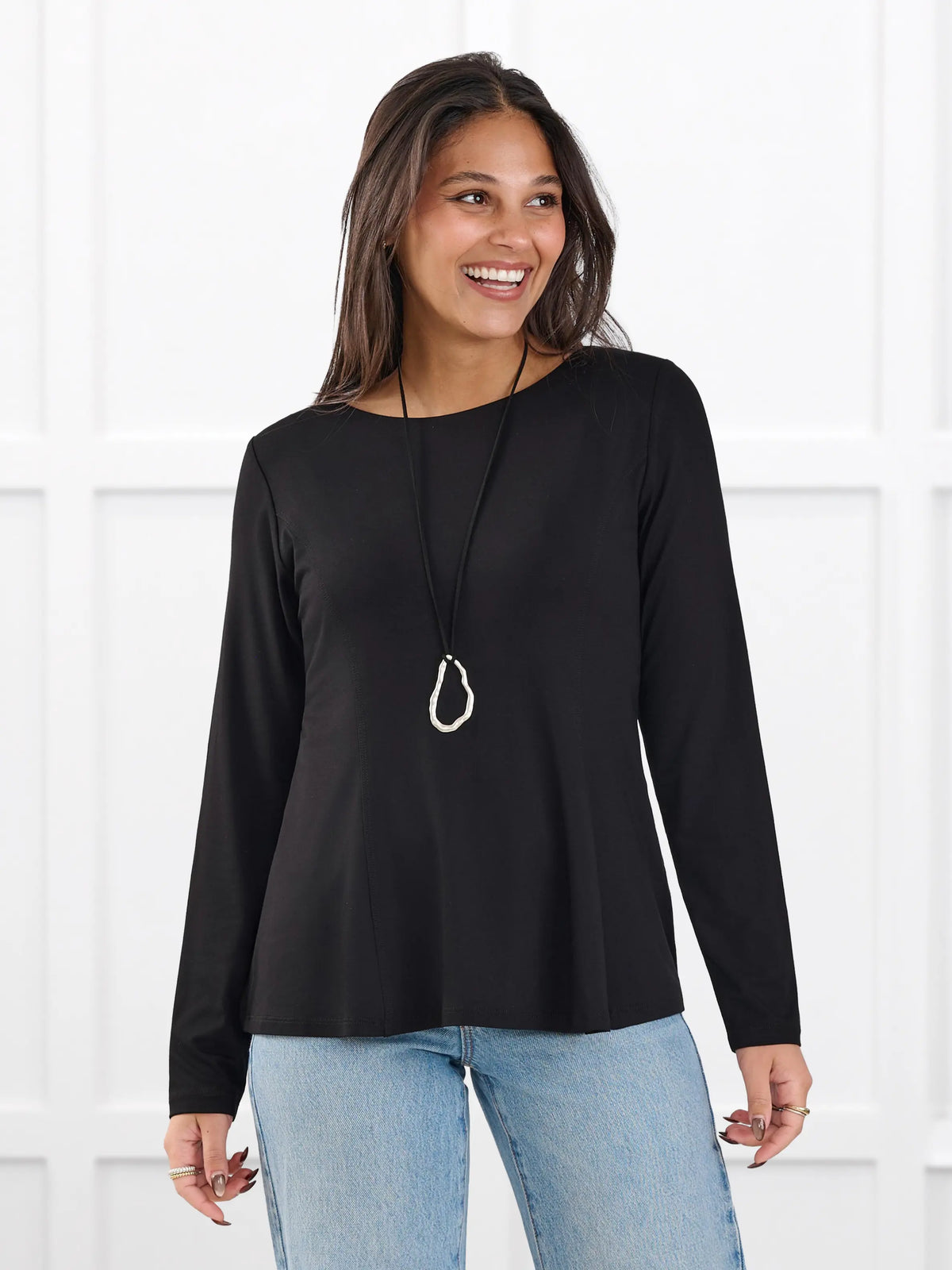 Sheera reversible neckline peplum top for women in Black on model Meron, size XS @Meron-XS 