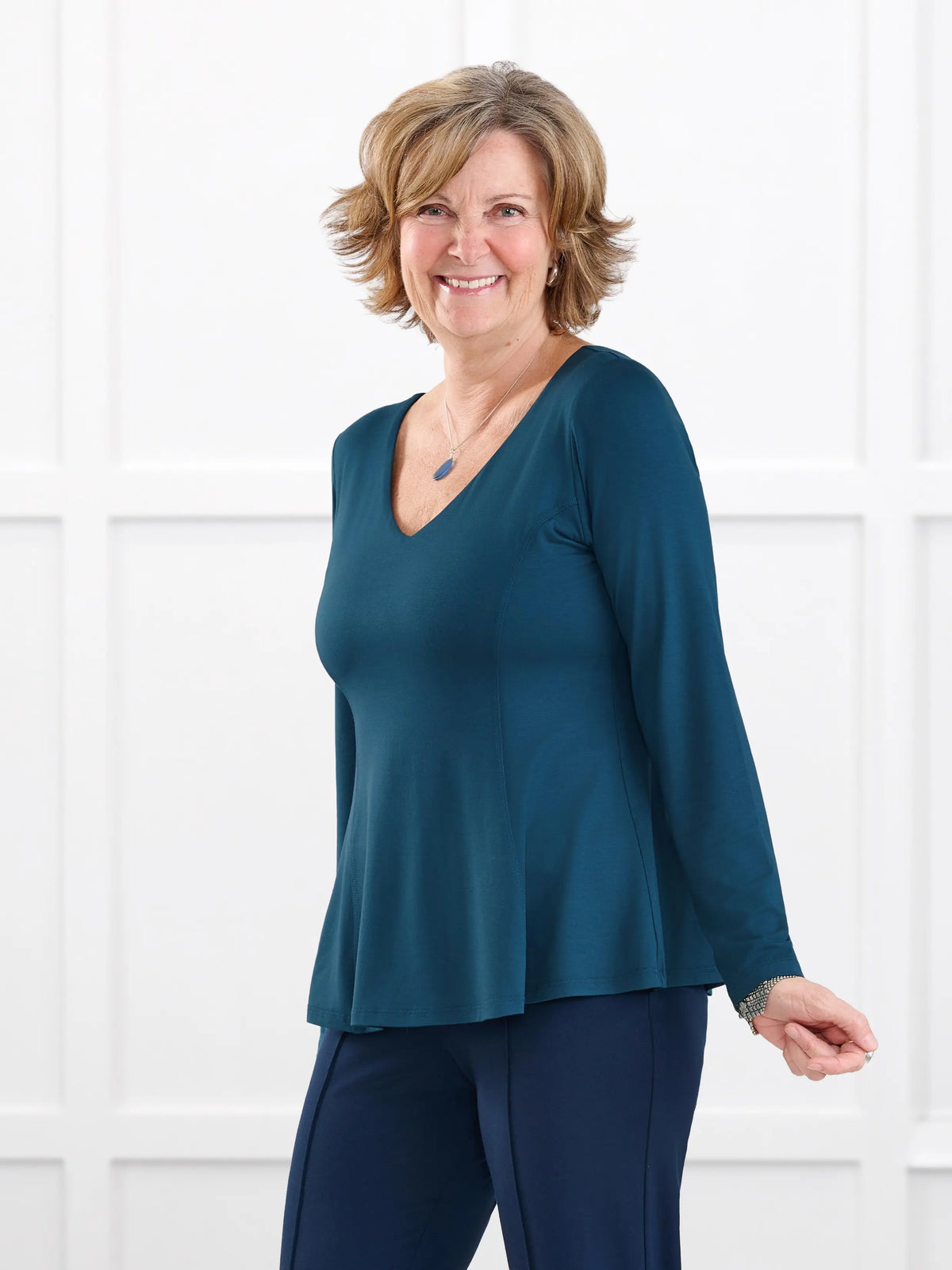 Sheera reversible neckline peplum top for women in Atlantic on model Donna, size S @Donna-S 