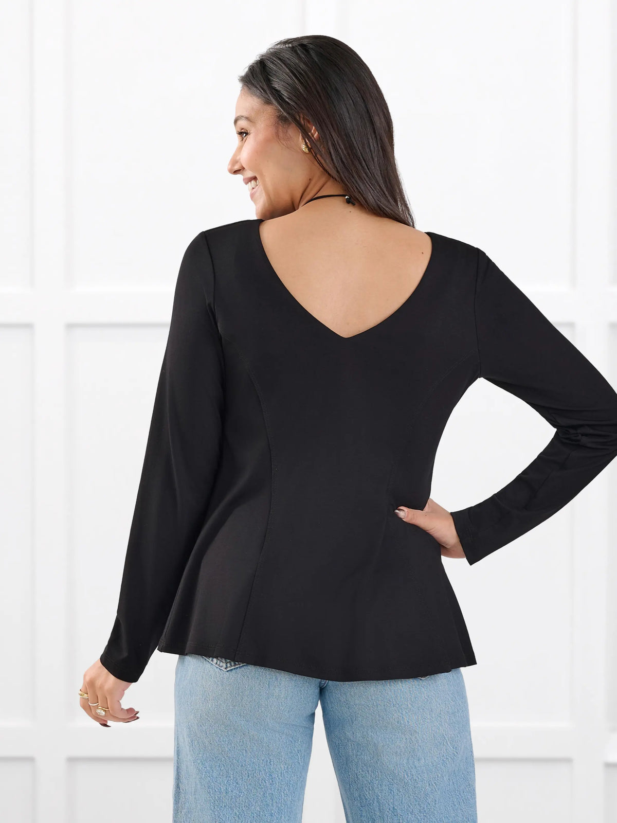 Sheera reversible neckline peplum top for women in Black on model Meron, size XS @Meron-XS 