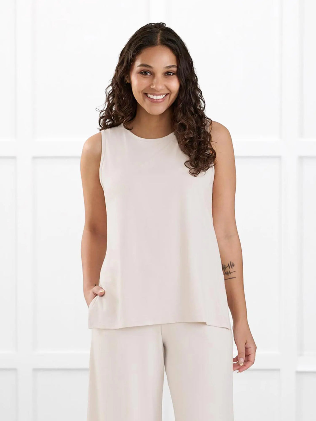 Shyanne reversible neckline side slit tank for women in Sandstone on model Meron, size XS Regular @Meron-XS-regular 