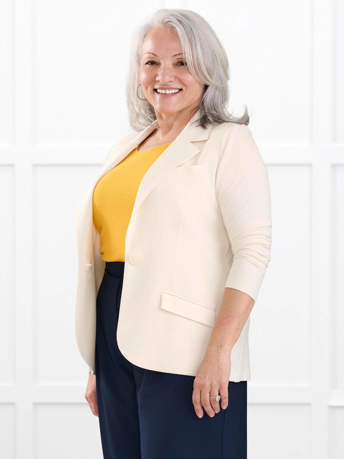 Sienna stretchy girlfriend blazer for women in Parchment on model Rula, size L @Rula-L 