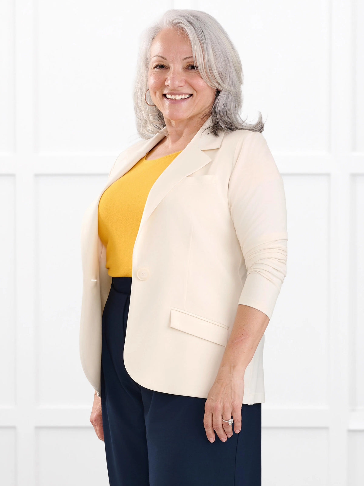 Sienna stretchy girlfriend blazer for women in Parchment on model Rula, size L @Rula-L 
