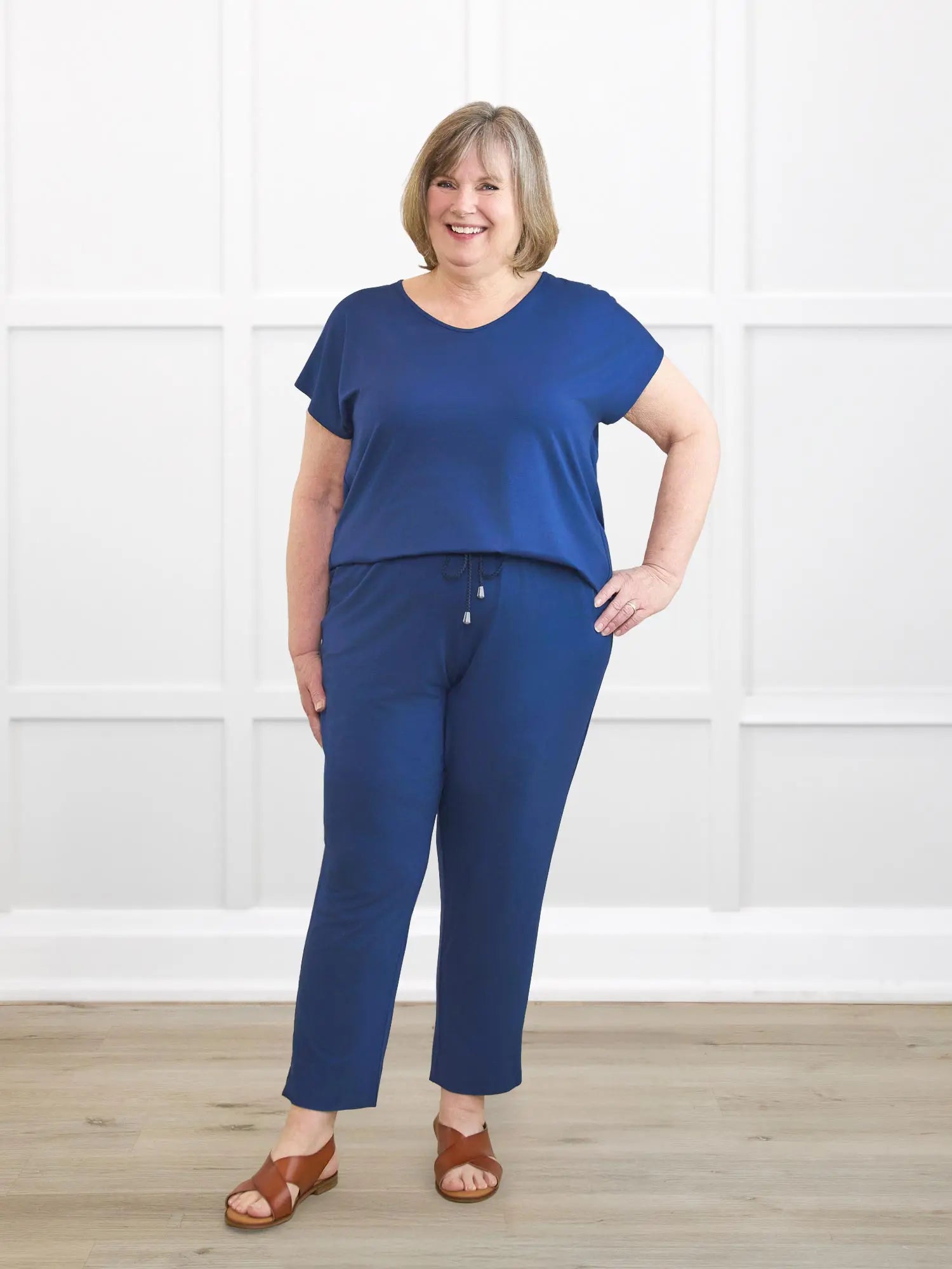 Stef v neck open back capri jumpsuit for women in Marine blue on model Laurie, size XL @Laurie-XL 
