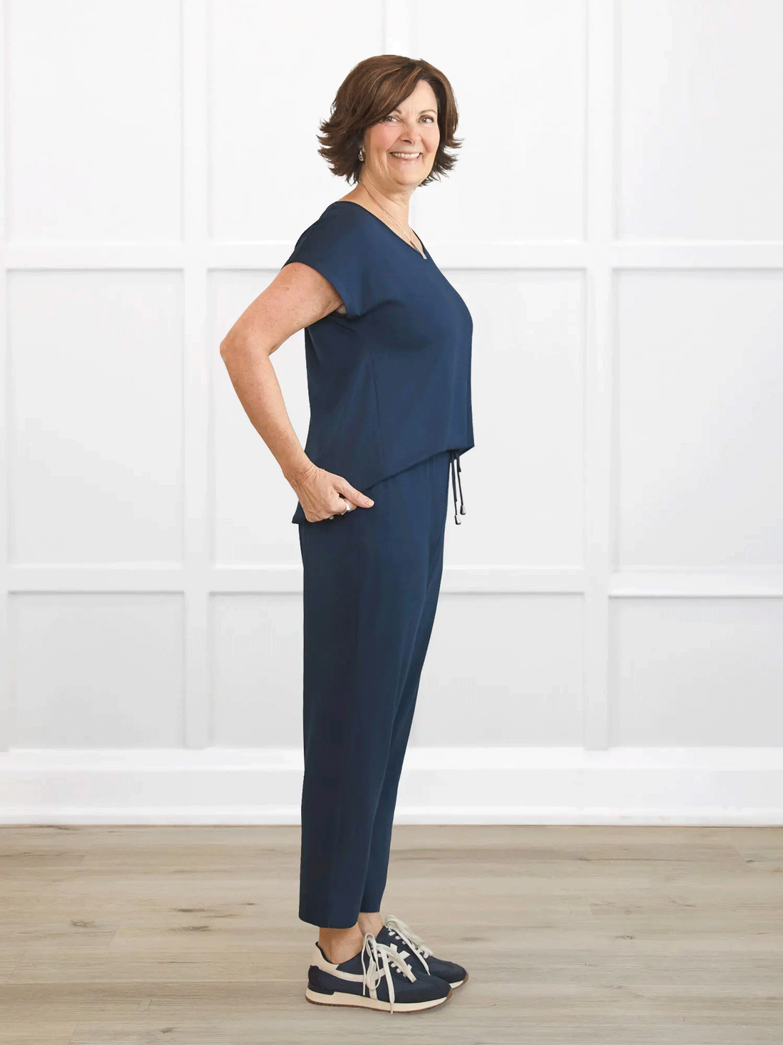 Stef v neck open back capri jumpsuit for women in Navy on model Donna, size S @Donna-S 