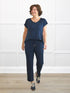 Stef v neck open back capri jumpsuit for women in Navy on model Donna, size S @Donna-S 