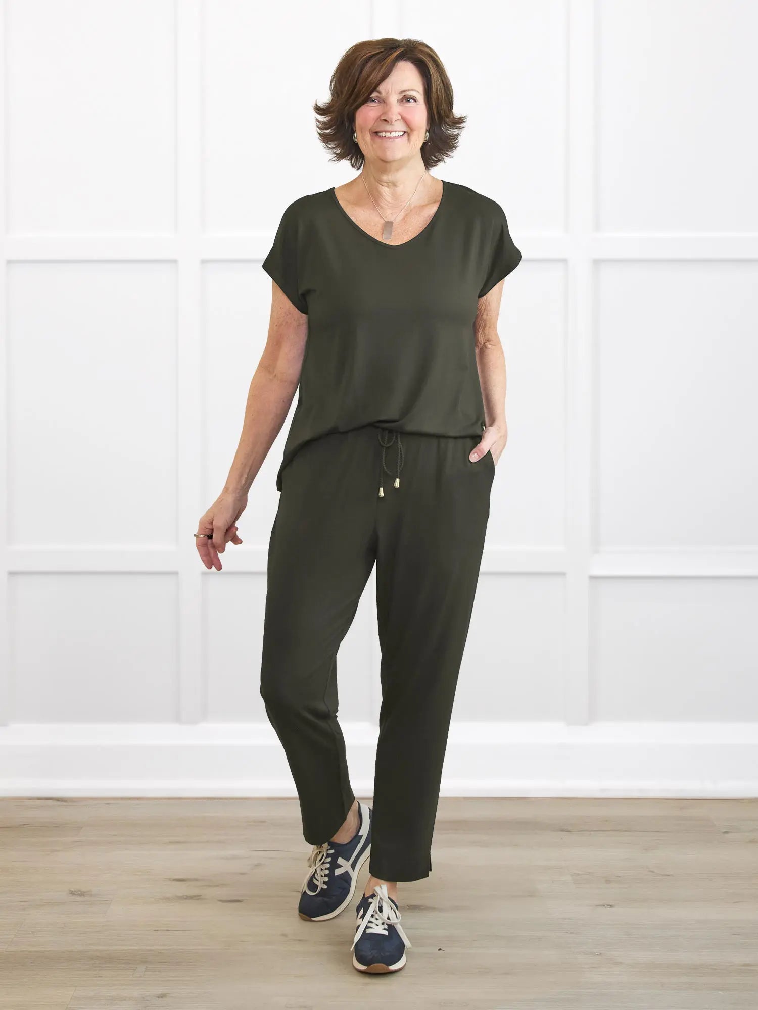 Stef v neck open back capri jumpsuit for women in Olive on model Donna, size S @Donna-S 