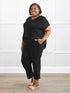 Stef v neck open back capri jumpsuit for women in Black on model Kimesha, size 3X @Kimesha-3X 
