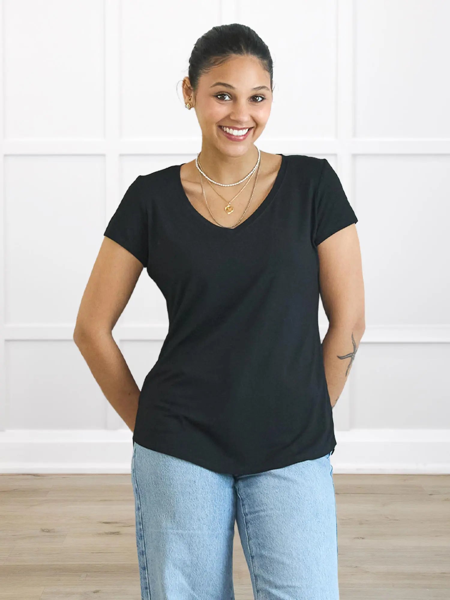 Sutton v neck classic tee in Black on model Meron, size XS Regular @Meron-XS-regular 