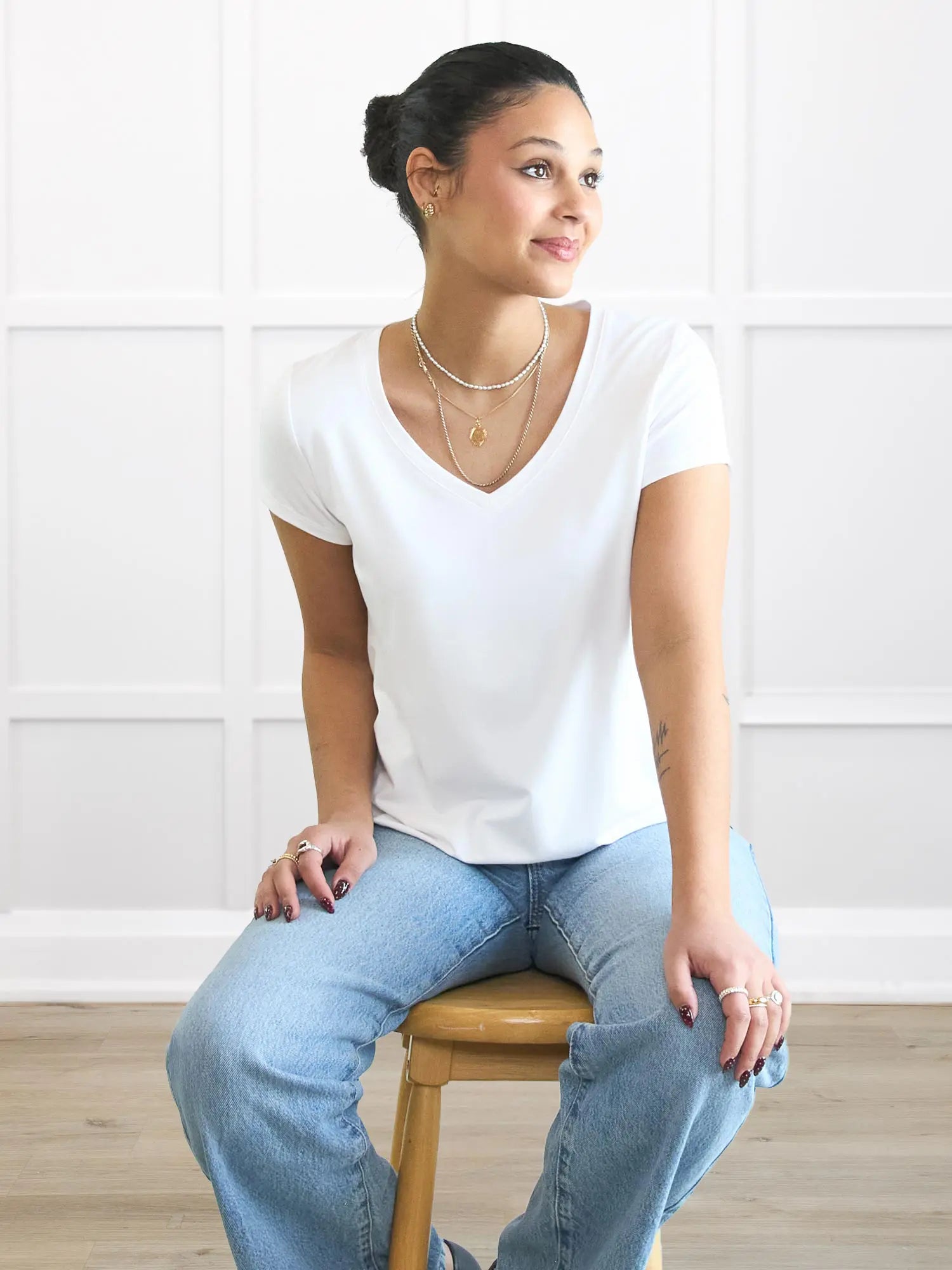 Sutton v neck classic tee for women in White on model Meron, size XS Regular @Meron-XS-regular 
