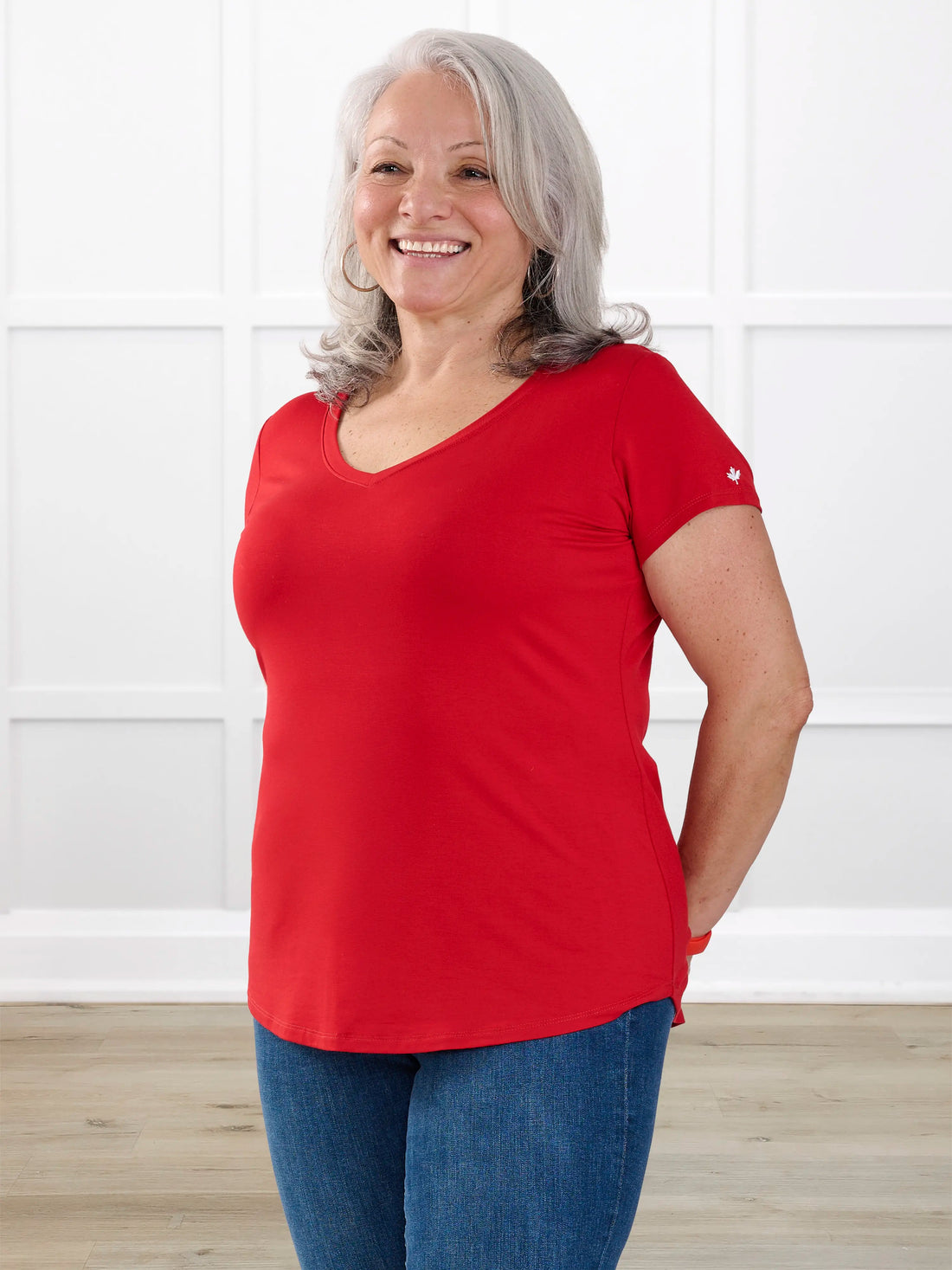 Sutton v neck maple leaf sleeve tee special edition for women in Poppy red with white leaf on model Rula, size L @Rula-L 
