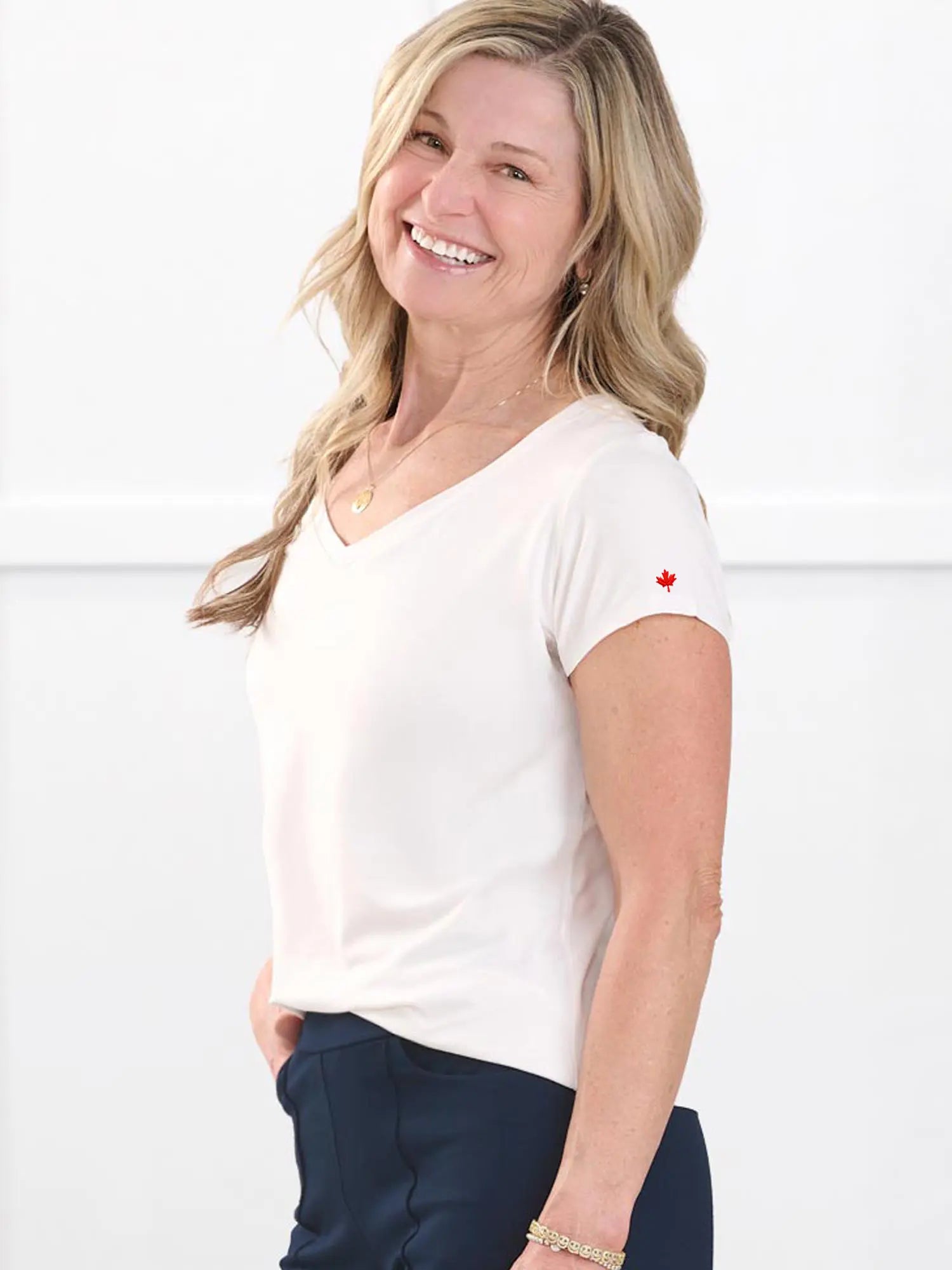 Sutton v neck maple leaf sleeve tee special edition for women in White with red leaf on model Rae, size XS @Rae-XS 