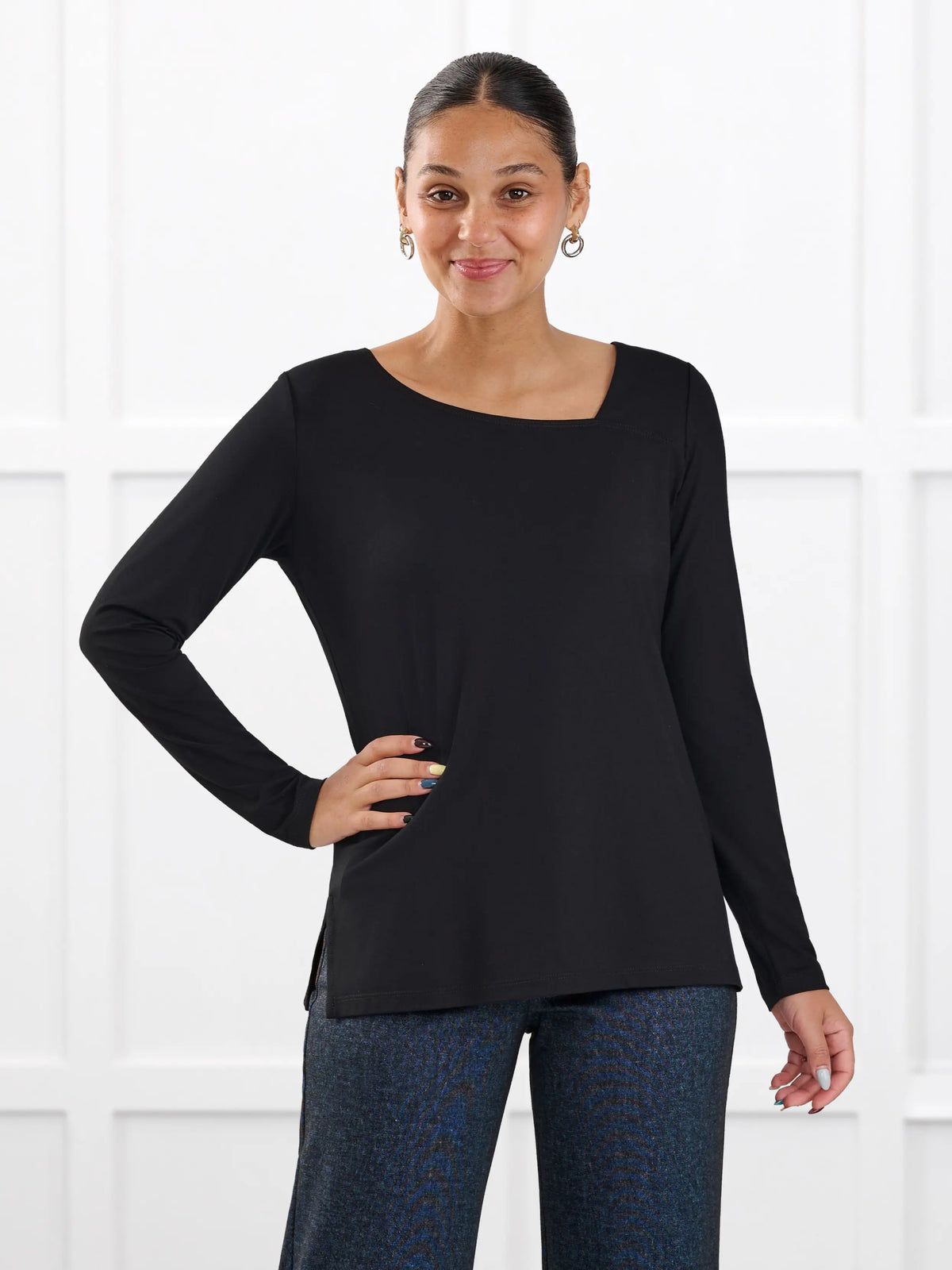 Tanna asymmetrical neckline top for women in Black on model Meron, size XS @Meron-XS 