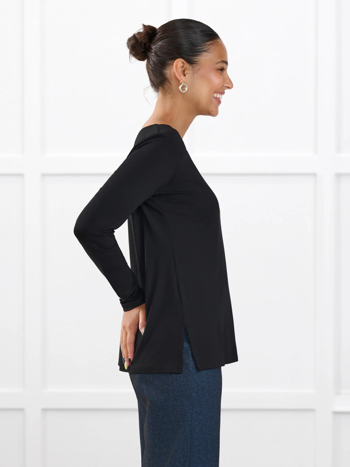 Tanna asymmetrical neckline top for women in Black on model Meron, size XS @Meron-XS 