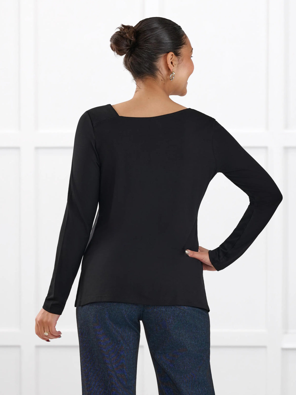 Tanna asymmetrical neckline top for women in Black on model Meron, size XS @Meron-XS 