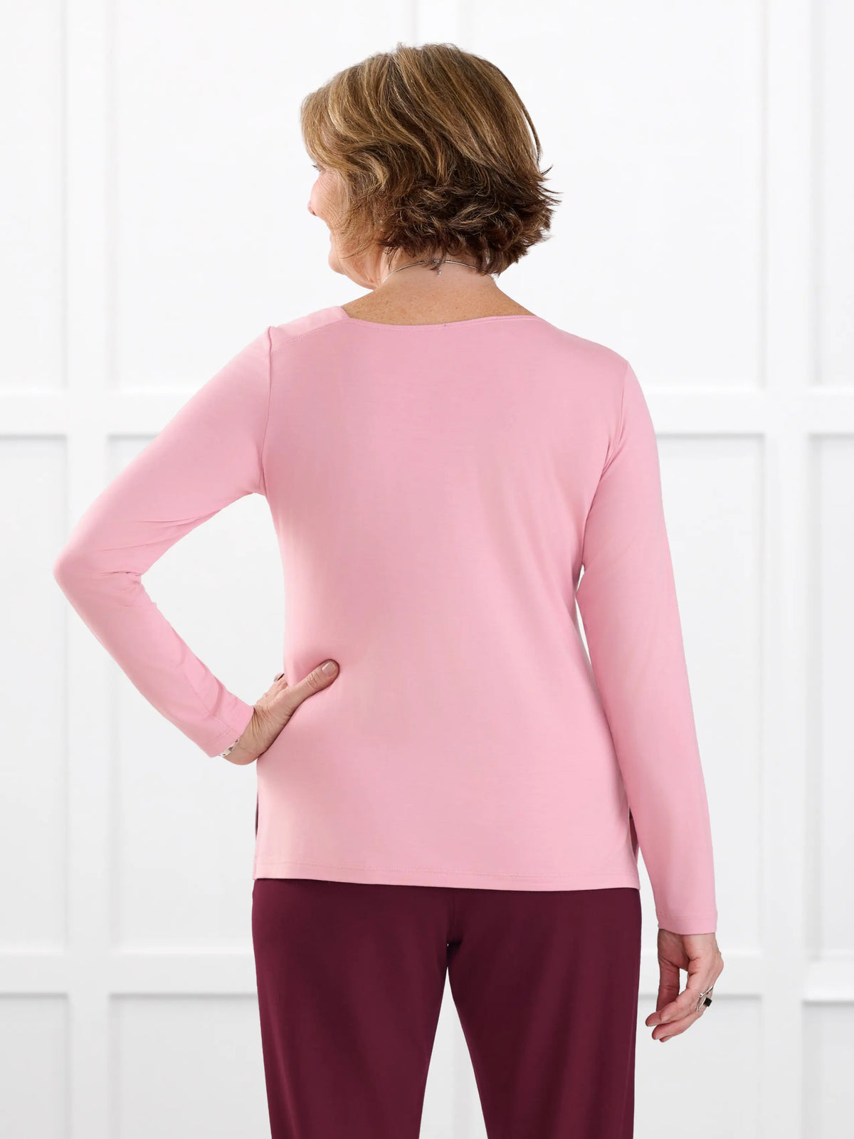 Tanna asymmetrical neckline top for women in Rosebud on model Donna, size S @Donna-S 