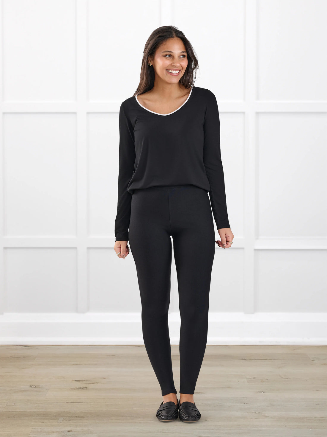 Tinsley mid rise fleece legging for women in Black on model Meron, size XS @Meron-XS 